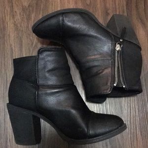 Black boots with side zippers